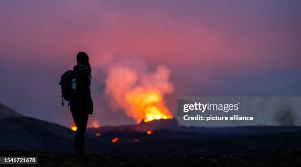 Dpatop - 21 July 2023, Iceland, Fagradalsfjall: Lava erupts from the crater of a volcano near the mountain Litli-Hrútur, about 40 kilometers...