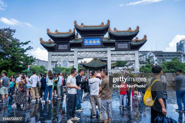 Tourists from all over China visit the historic Jiaxiu Pavilion in Guiyang, Guizhou Province, China, July 20, 2023.