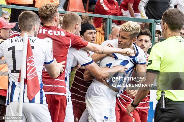 Standard's players react during a friendly soccer match between Standard de Liege and Hertha Berlijn, Friday 21 July 2023 in Liege, in preparation of...