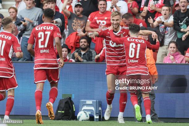Standard's Denis Dragus celebrates after scoring during a friendly soccer match between Standard de Liege and Hertha Berlijn, Friday 21 July 2023 in...
