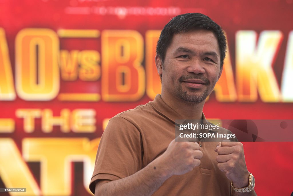Manny Pacquiao, a Filipino boxer poses for a photo to the...