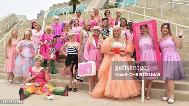 Barbie cosplayers pose outside the convention center during San Diego Comic-Con International in San Diego, California, on July 20, 2023.
