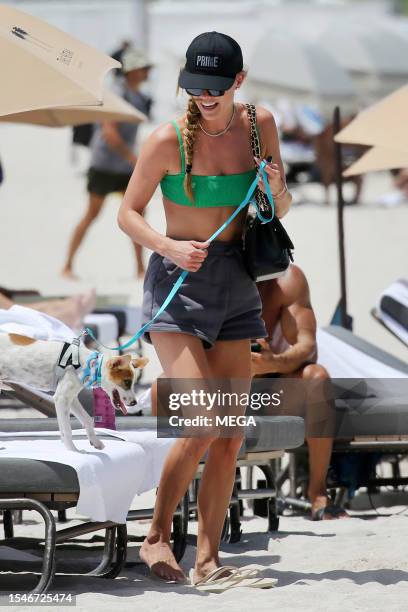 Nina Agdal is seen on the beach on July 21, 2023 in Miami Beach, Florida.