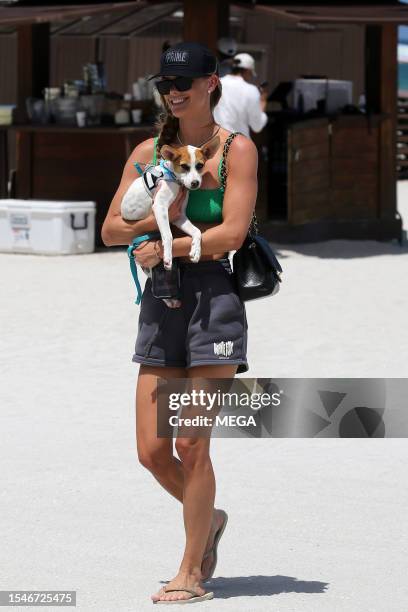 Nina Agdal is seen on the beach on July 21, 2023 in Miami Beach, Florida.