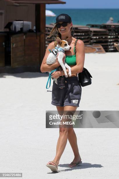 Nina Agdal is seen on the beach on July 21, 2023 in Miami Beach, Florida.