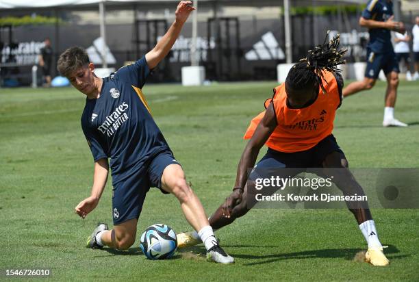 Arda Güler of Real Madrid steals the ball from Eduardo Camavinga during training at UCLA Campus on July 21, 2023 in Los Angeles, California.