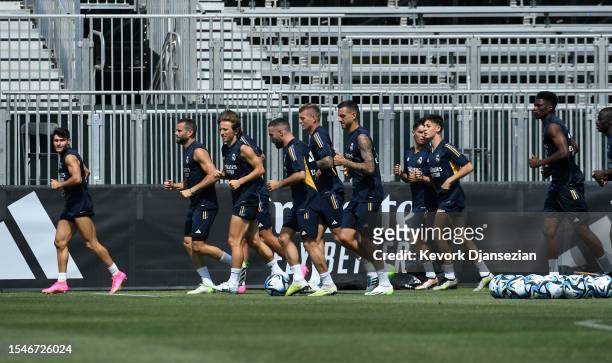 Real Madrid players warm up during training at UCLA Campus on July 21, 2023 in Los Angeles, California.