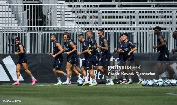 Real Madrid players warm up during training at UCLA Campus on July 21, 2023 in Los Angeles, California.