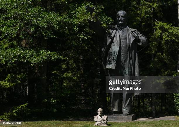Busts and statue of Vladimir Lenin seen inside Grutas Park, a captivating museum featuring Soviet-era statues, and relics from Lithuania's past under...
