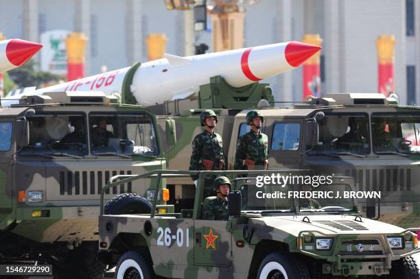 China's military show off their latest missiles during the National Day parade in Beijing on October 1, 2009. China celebrated 60 years of communist...