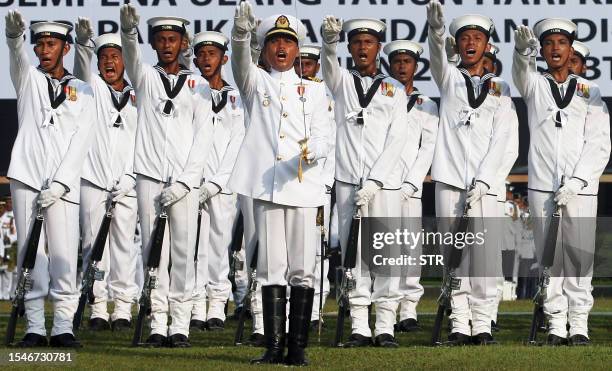 The Royal Malay Regiment salute during Malaysia's King Sultan Mizan Zainal Abidin birthday celebration in Kuala Lumpur on June 6, 2009. King Mizan...