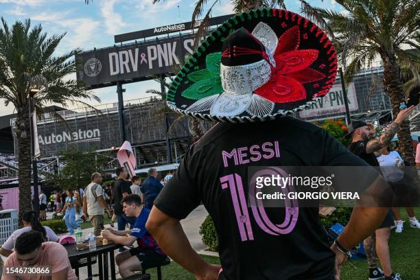 Fan wears a Lionel Messi shirt and a Mexican charro hat in front of DRV PNK stadium before the League Cup match between Liga MX's Cruz Azul and Major...