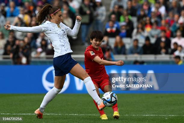 S forward Alex Morgan fights for the ball with Vietnam's defender Thi Thu Tran during the Australia and New Zealand 2023 Women's World Cup Group E...