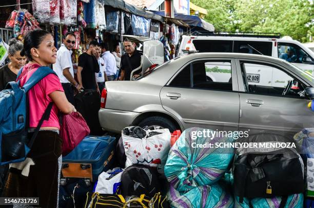 Passengers wait to be transported at the passenger terminal in Cucuta, Colombia, on July 21, 2023. Public transportation on the Colombia-Venezuela...