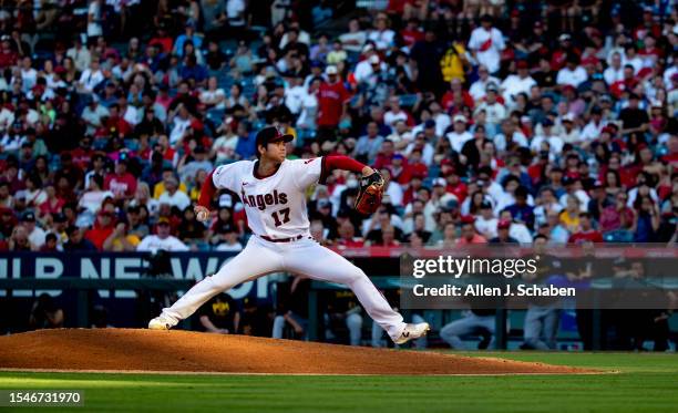 Anaheim, CA Evening sunlight illuminates Angels starting pitcher and two-way player Shohei Ohtani as he delivers a pitch in the second inning against...