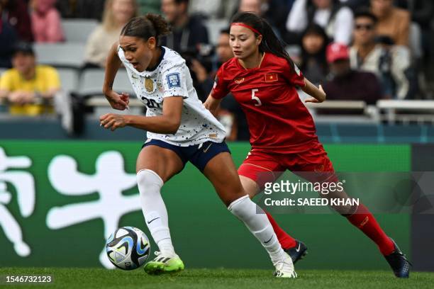 S forward Trinity Rodman fights for the ball with Vietnam's defender Thi Loan Hoang during the Australia and New Zealand 2023 Women's World Cup Group...