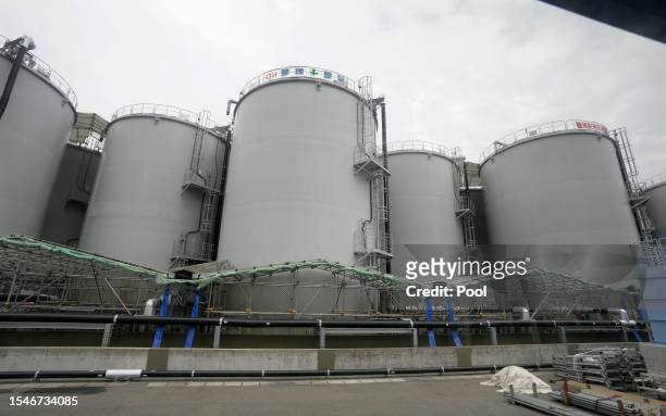 The storage tanks of the radioactive water treated by the Advanced Liquid Processing System into the sea are lined at Tokyo Electric Power Companys...