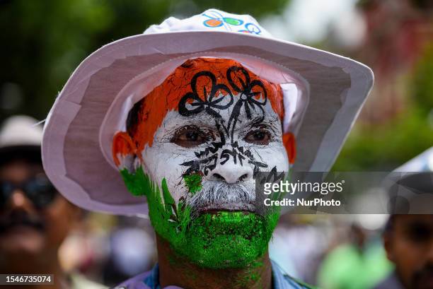Supporters of the Trinamool Congress party are seen dressed in various attire during a rally addressed West Bengal's Chief Ministers and party...