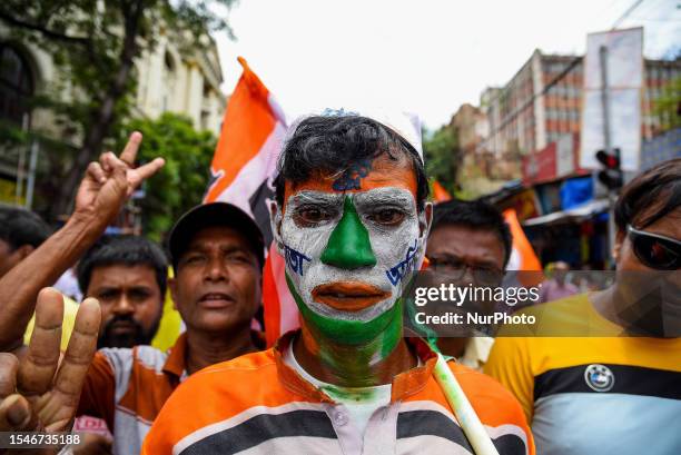 Supporters of the Trinamool Congress party are seen dressed in various attire during a rally addressed West Bengal's Chief Ministers and party...