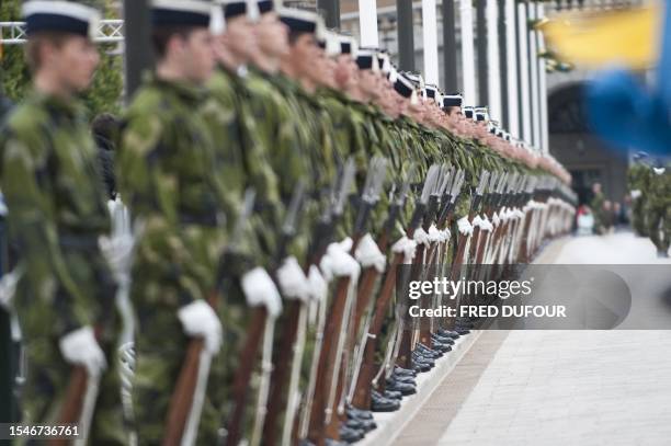 Swedish soldiers practice the ultimate preparations near the Royal Palace in Stockholm June 18, 2010 on the eve of the wedding of Sweden's Crown...