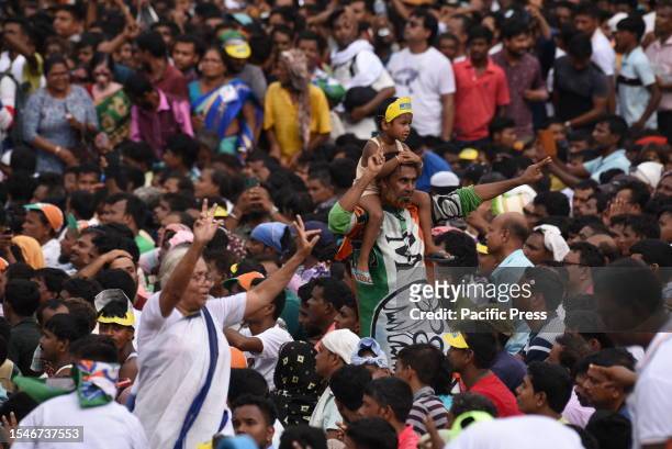 Trinamool Congress supporters attend a rally marking Martyr's Day. The event was held in memory of fourteen Congress party supporters who were killed...