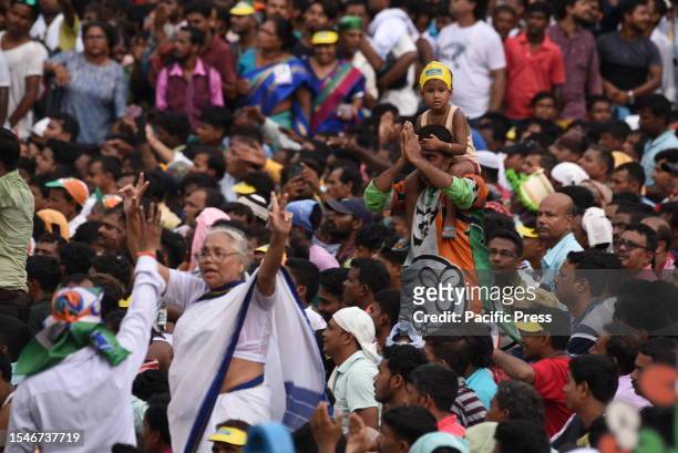 Trinamool Congress supporters attend a rally marking Martyr's Day. The event was held in memory of fourteen Congress party supporters who were killed...
