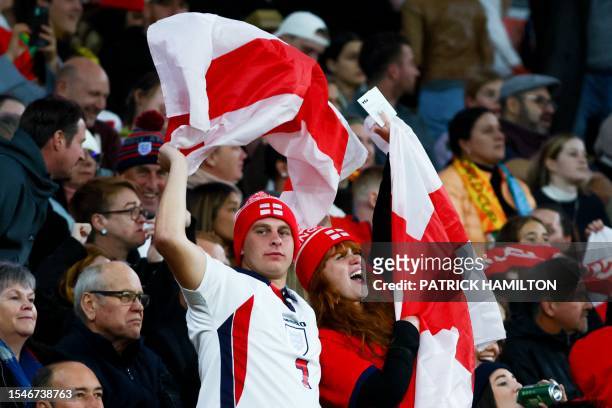 England fans celebrate their team's first goal during the Australia and New Zealand 2023 Women's World Cup Group D football match between England and...