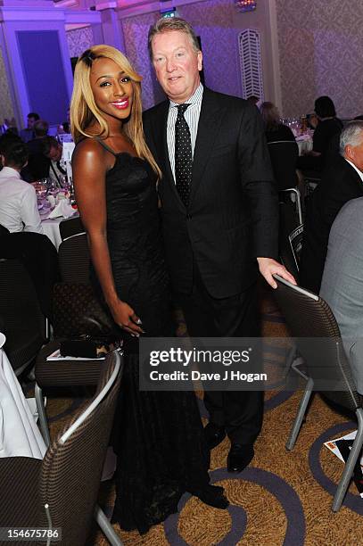 Alexandra Burke and Frank Warren attend a Nordoff Robbins Boxing fundraising dinner at The Grand Connaught Rooms on October 24, 2012 in London,...