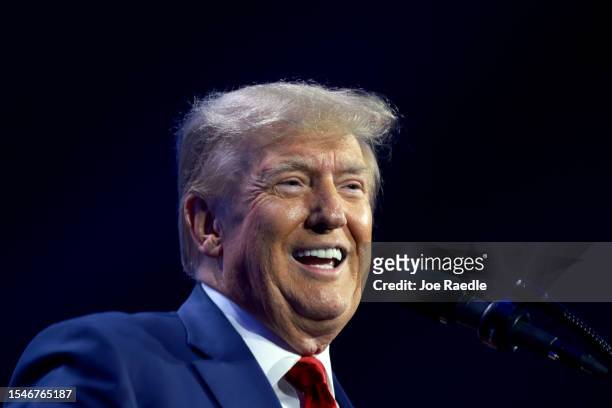 Former US President Donald Trump speaks at the Turning Point Action conference as he continues his 2024 presidential campaign on July 15, 2023 in...