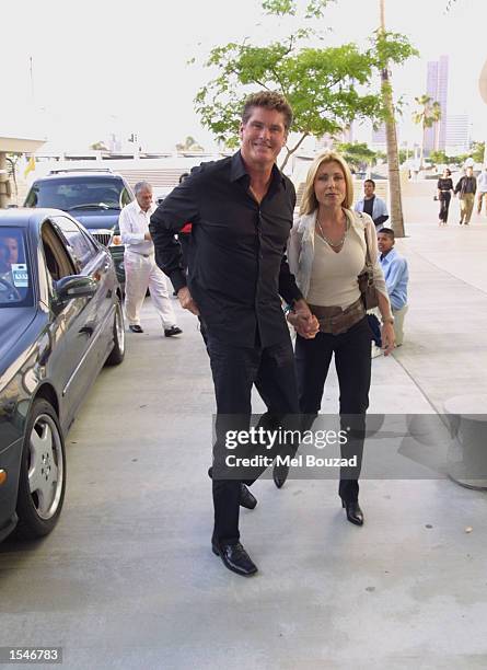 Actor David Hasselhoff and Pamela Bach arrive for the NBA playoff game between the L.A. Lakers and the Sacramento Kings at the Staples Center May 31,...