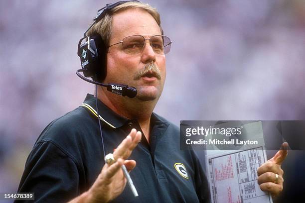 Head coach Mike Holmgren of the Green Bay Packers looks on during a football game against the Philadelphia Eagles on September 27, 1997 at Veterans...