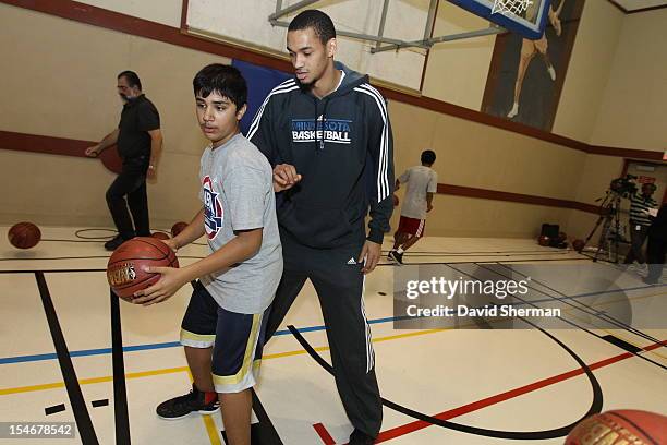 Chris Johnson of the Minnesota Timberwolves participates in a youth clinic during NBA Canada Series 2012 on October 23, 2012 at the Magnus Eliason...