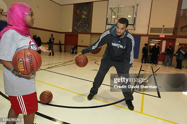 Chris Johnson of the Minnesota Timberwolves participates in a youth clinic during NBA Canada Series 2012 on October 23, 2012 at the Magnus Eliason...