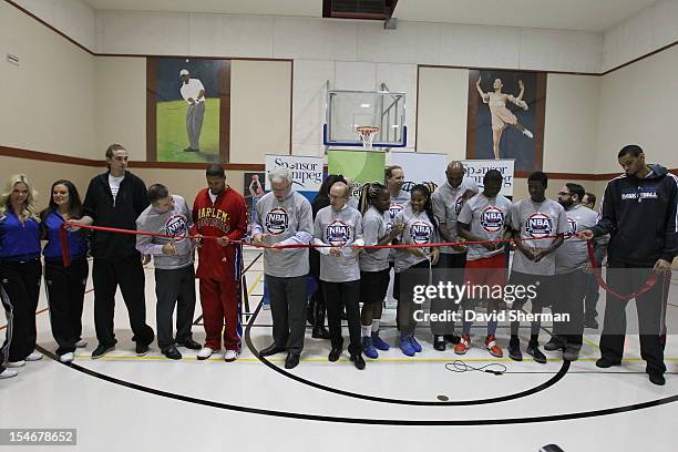 Legend Clyde Drexler along with Alexey Shved and Chris Johnson of the Minnesota Timberwolves and Chris "Handles" Franklin of the Harlem Globetrotters...