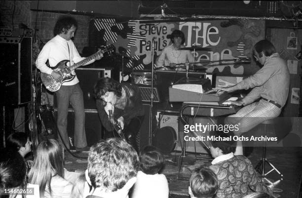 Guitarist Robby Krieger, singer Jim Morrison, drummer John Densmore and keyboardist Ray Manzarek of the rock and roll band 'The Doors' perform...