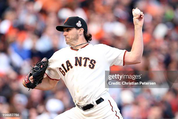 Barry Zito of the San Francisco Giants throws a pitch in the first inning against the Detroit Tigers during Game One of the Major League Baseball...