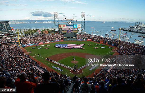 General view of fans stand for the national athem prior to Game One between the San Francisco Giants and the Detroit Tigers in the Major League...