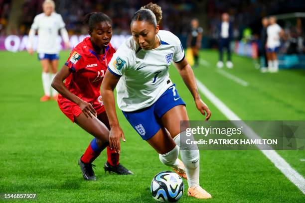England's forward Lauren James dribbles past Haiti's defender Betina Petit-Frere during the Australia and New Zealand 2023 Women's World Cup Group D...