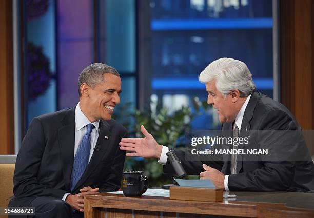 President Barack Obama chats with host Jay Leno during a taping of “The Tonight Show with Jay Leno” October 24, 2012 at NBC Studios in Burbank,...