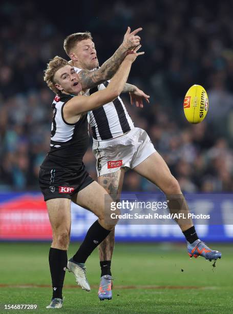 Jason Horne-Francis of the Power and Jordan De Goey of the Magpies during the 2023 AFL Round 19 match between the Port Adelaide Power and the...
