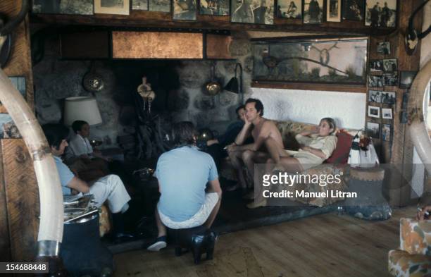 In 1971, The bullfighter Luis Miguel Dominguin smoking a cigarette, shirtless, with family or friends whose Carmen SEVILLA, former partner of Luis...
