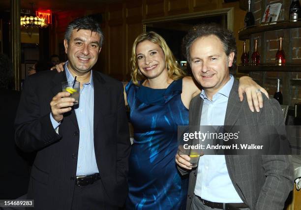 Sparkling wine production technician Franco Brezza, celebrity chef Donatella Arpaia and General Manager of the Martini factories at Pessione and...