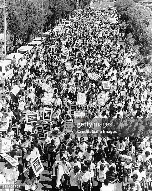 Thousands of protesters march for the release of anti-apartheid activist, Nelson Mandela, Johannesburg, South Africa, circa 1987.