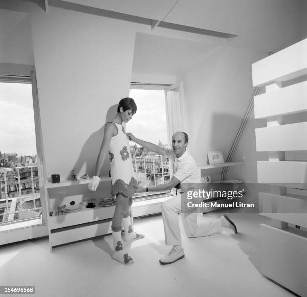 In Paris, in August 1967, Andre COURREGES preparing the parade of his creations called 'stitch-future' inspired by kinetic art: in his secret...