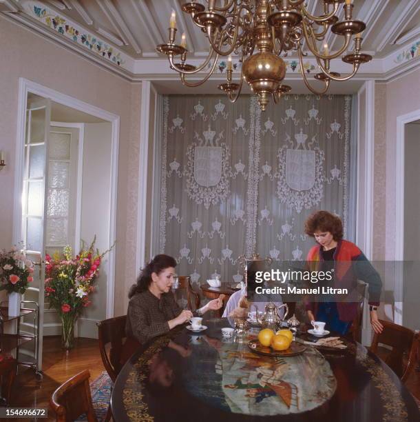 Mstislav Rostropovich and his wife Galina Vishnevskaya in their Paris apartment with their eldest daughter Olga , cellist and also a model. October...