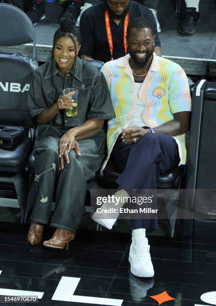 Gabrielle Union and Dwyane Wade sit courtside as they attend the 2023 WNBA All-Star Game at Michelob ULTRA Arena on July 15, 2023 in Las Vegas,...