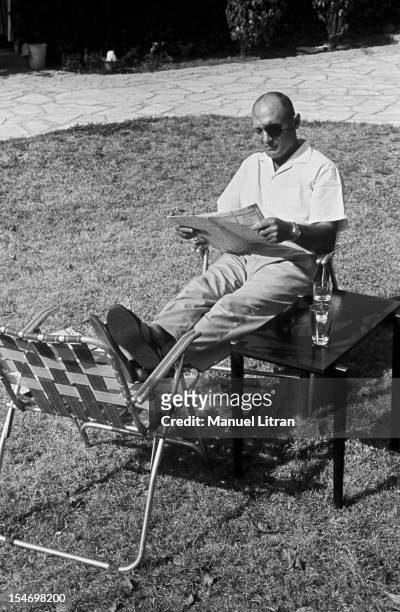 Israel, in July 1967, Moshe Dayan, in his garden, his house has Zahala in the suburbs of Tel Aviv, sitting on a garden chair, feet on another chair,...