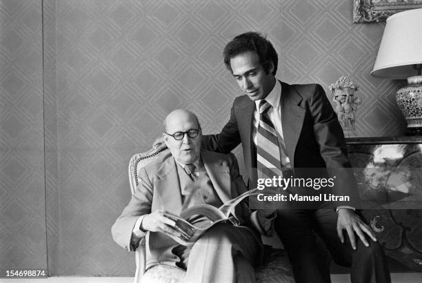 Paris, 8 November 1977 Olivier Dassault, grand-son of Marcel Dassault, poses with his grandfather, who reads Paris Match.