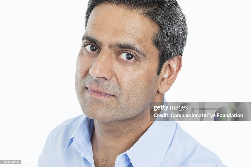 Portrait of mature businessman, close up