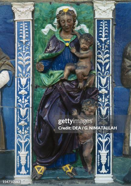 Allegory of Charity, detail from the Seven Works of Mercy, 1525-1528, by Santi Buglioni , glazed terracotta frieze, Ceppo Hospital, Pistoia, Tuscany....